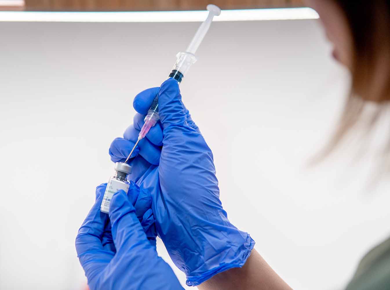 dr. agnes using a syringe