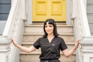 autumn smiling in a headshot photo