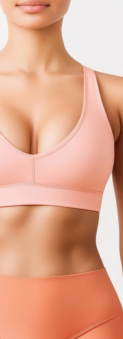 woman in sporty outfit after tubular breast correction