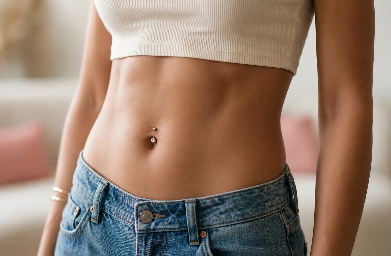 belly piercing before being removed and area rejuvenated