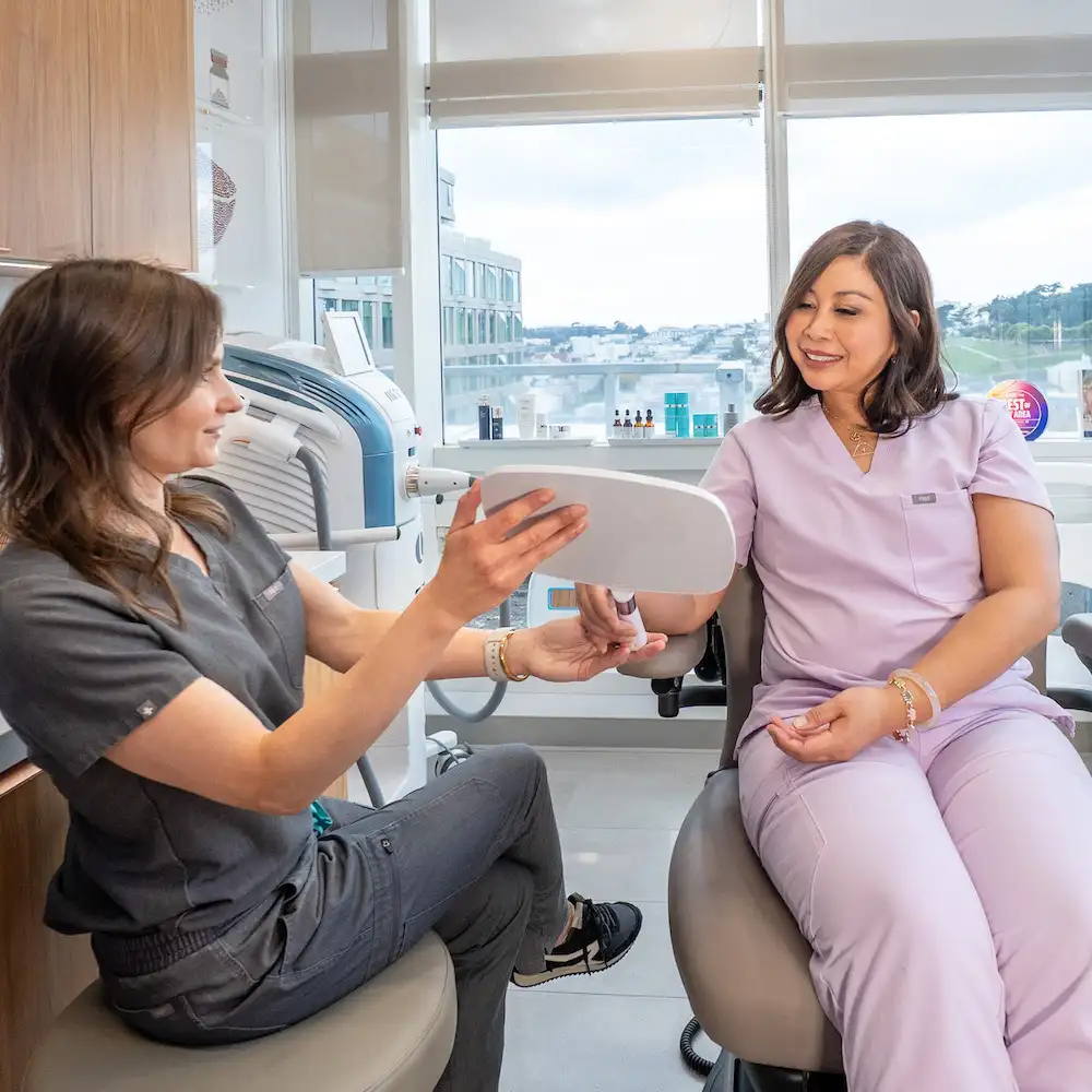 patient looking at results after botox treatment
