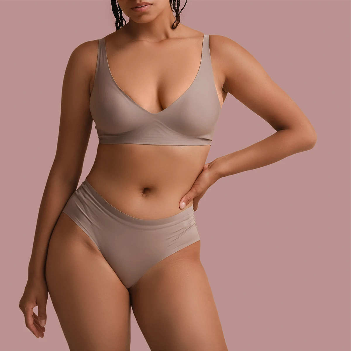 curvy woman posing in underwear post weight loss