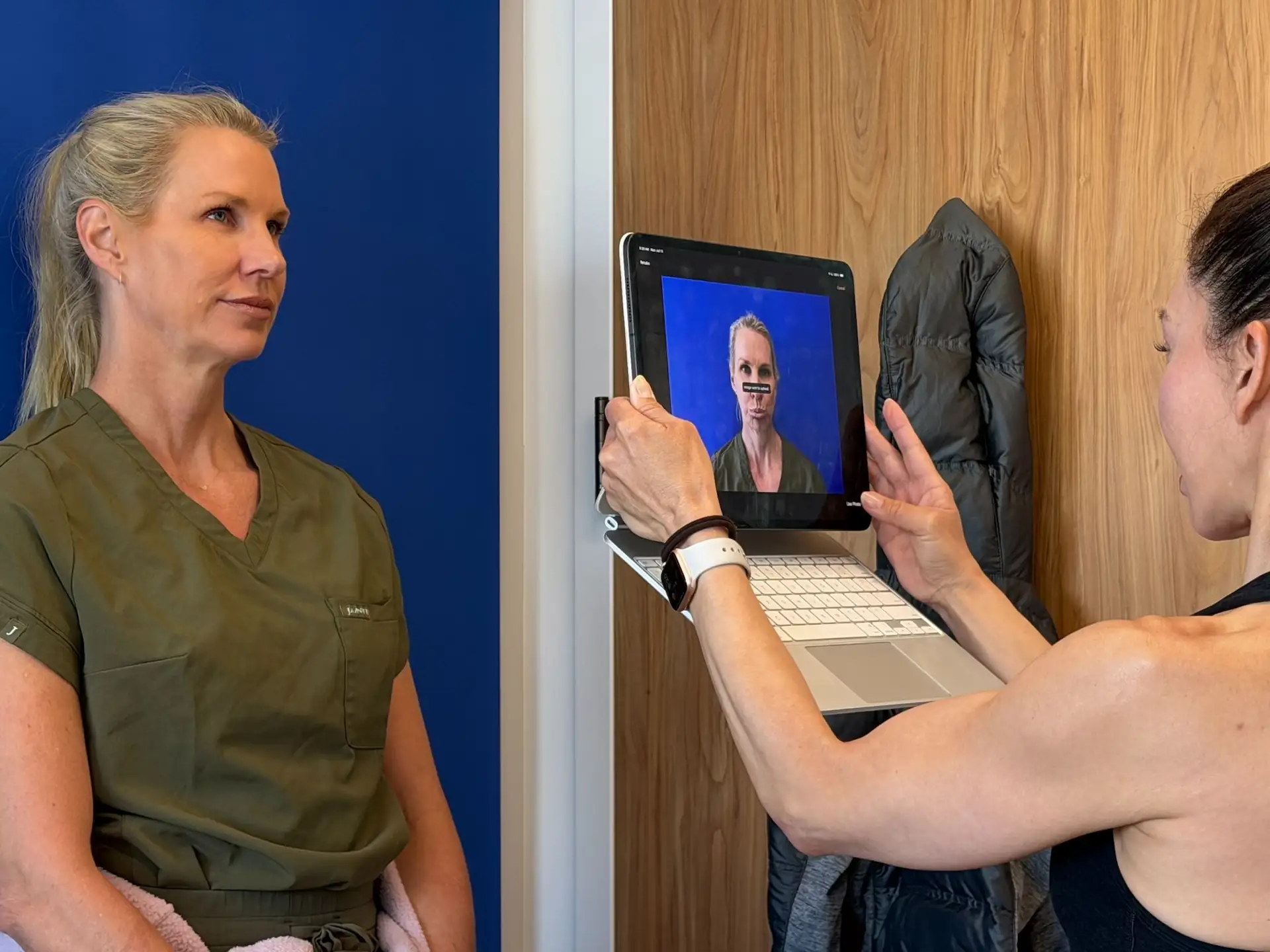 bautista examining karen horton with medical device