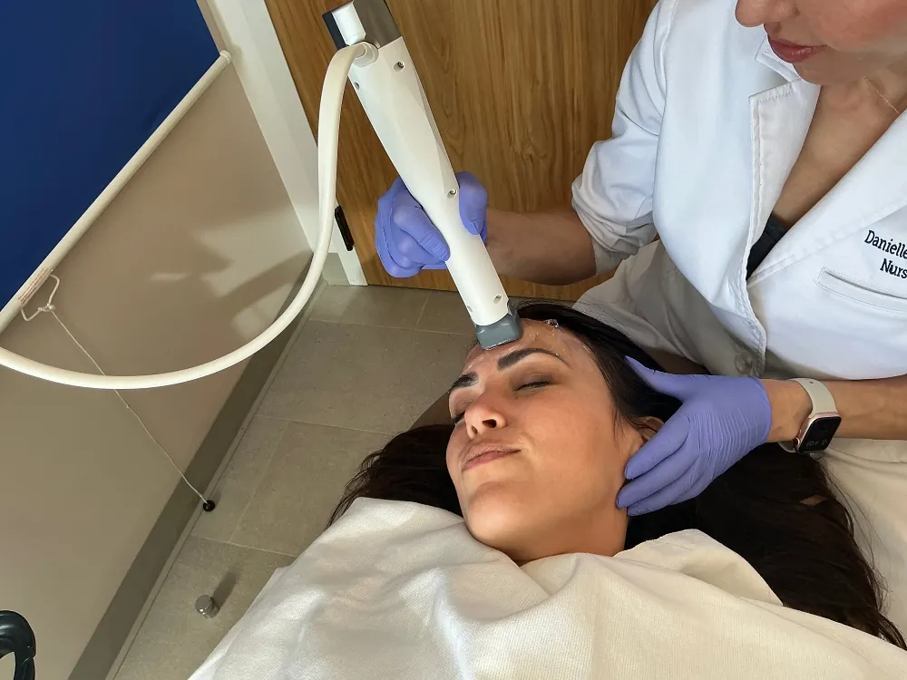 Woman receiving XERF treatment at San Francisco Plastic Surgery